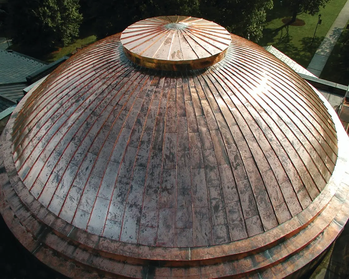 Craftsman Roofing crew installing a new roof in Burlington